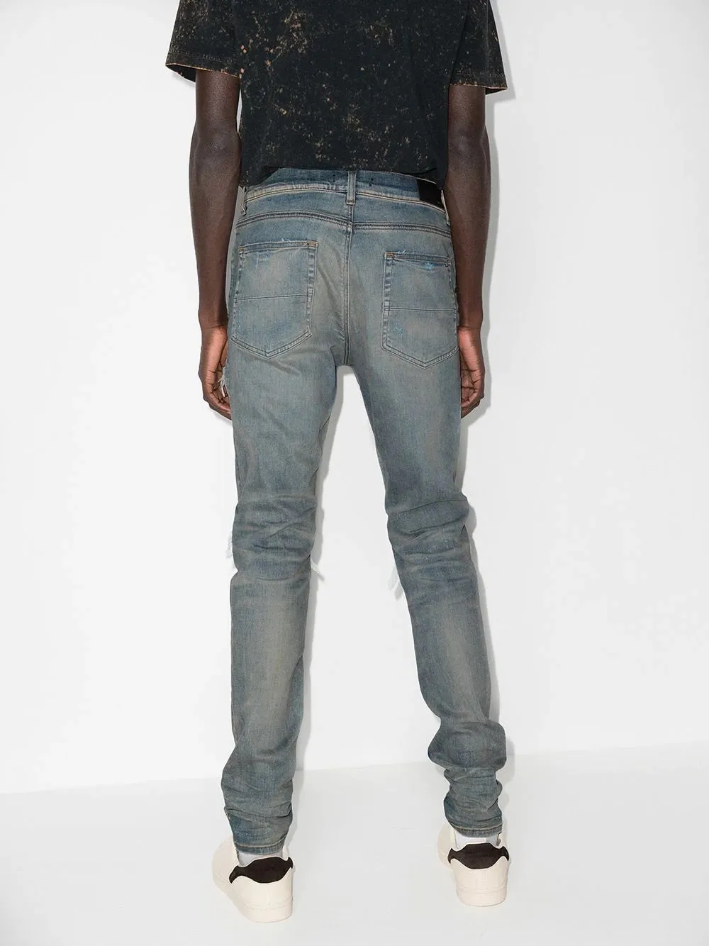 AMIRI MX1 DISTRESSED EFFECT SKINNY JEANS