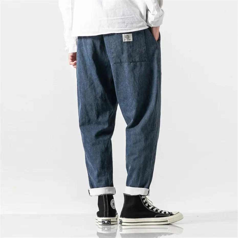 CLASSIC TAPERED DENIM PANTS
