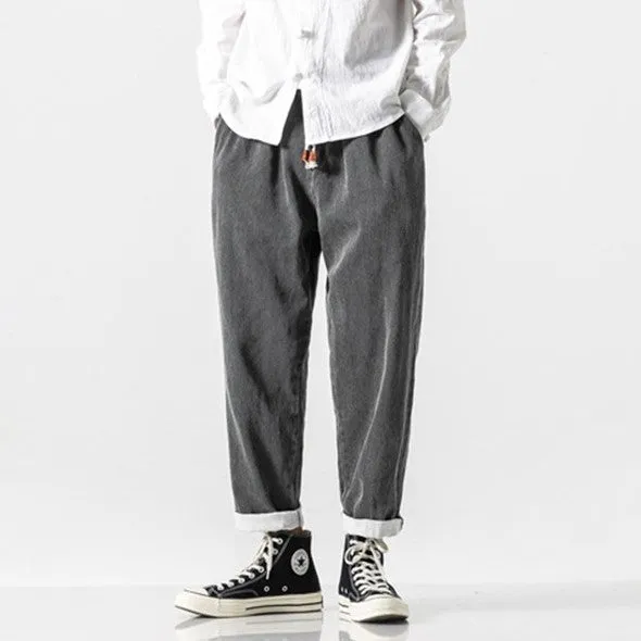 CLASSIC TAPERED DENIM PANTS