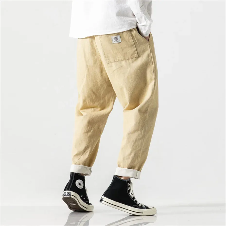 CLASSIC TAPERED DENIM PANTS