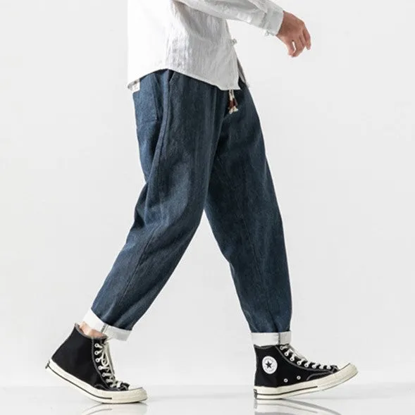 CLASSIC TAPERED DENIM PANTS
