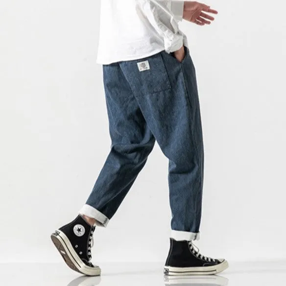 CLASSIC TAPERED DENIM PANTS