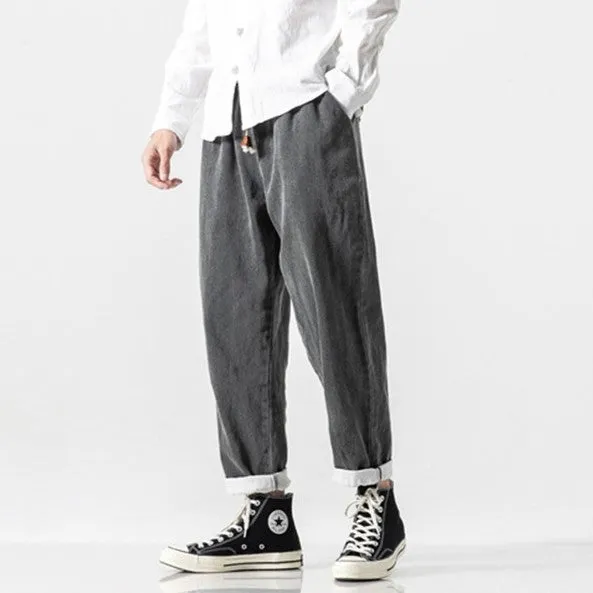 CLASSIC TAPERED DENIM PANTS