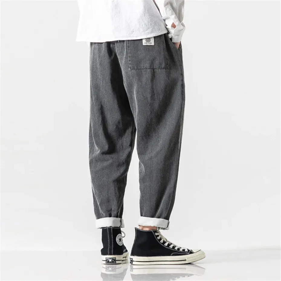 CLASSIC TAPERED DENIM PANTS